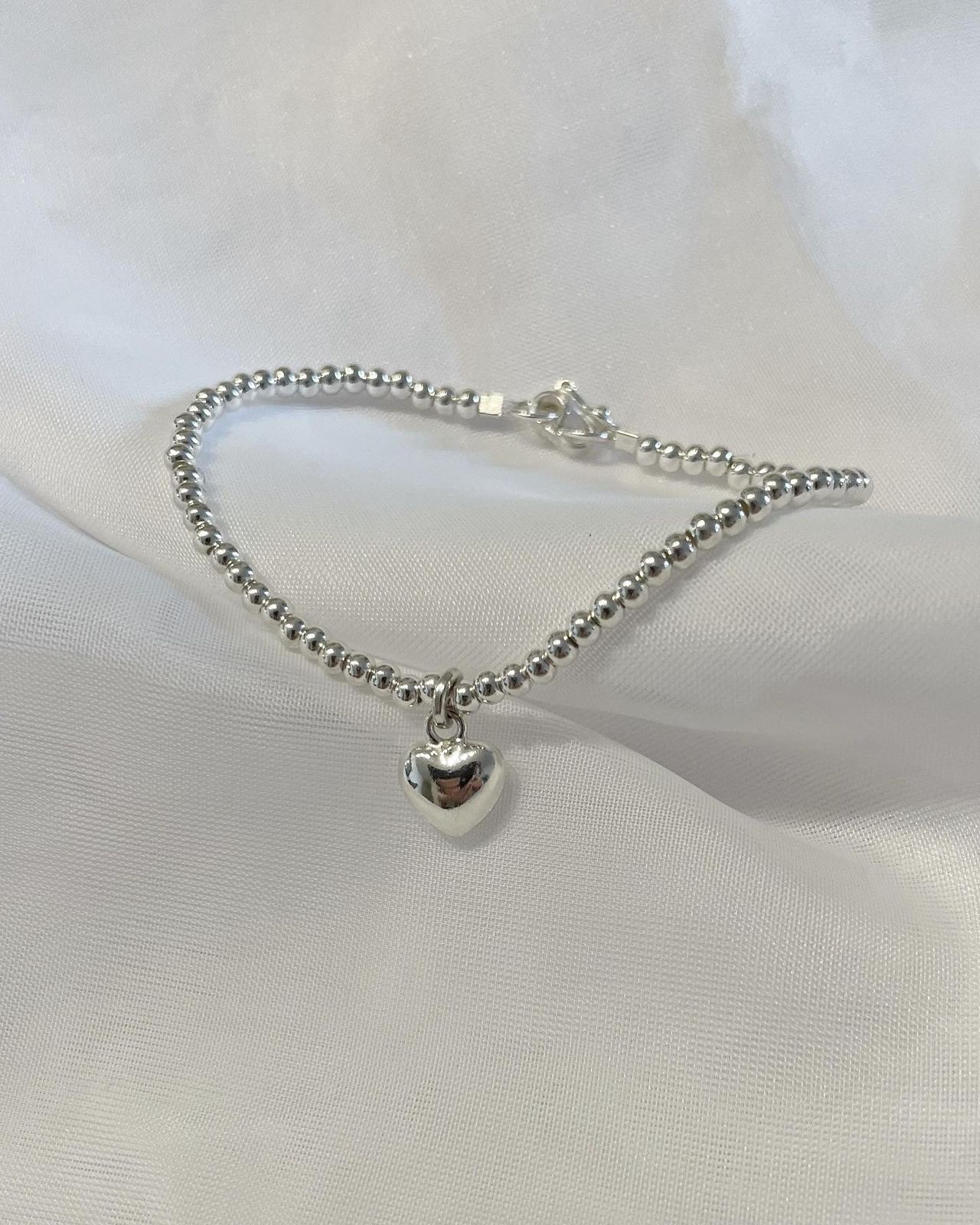 Pulsera Bolitas con Corazón Toggle
